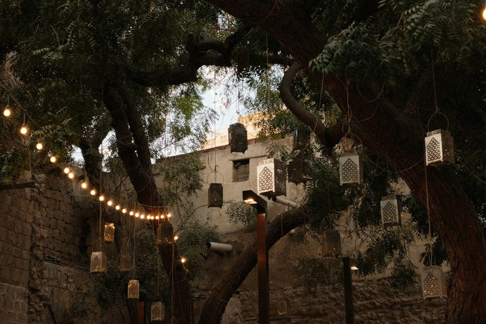 Traditional courtyard in Jeddah, Saudi Arabia, decorated with hanging lanterns